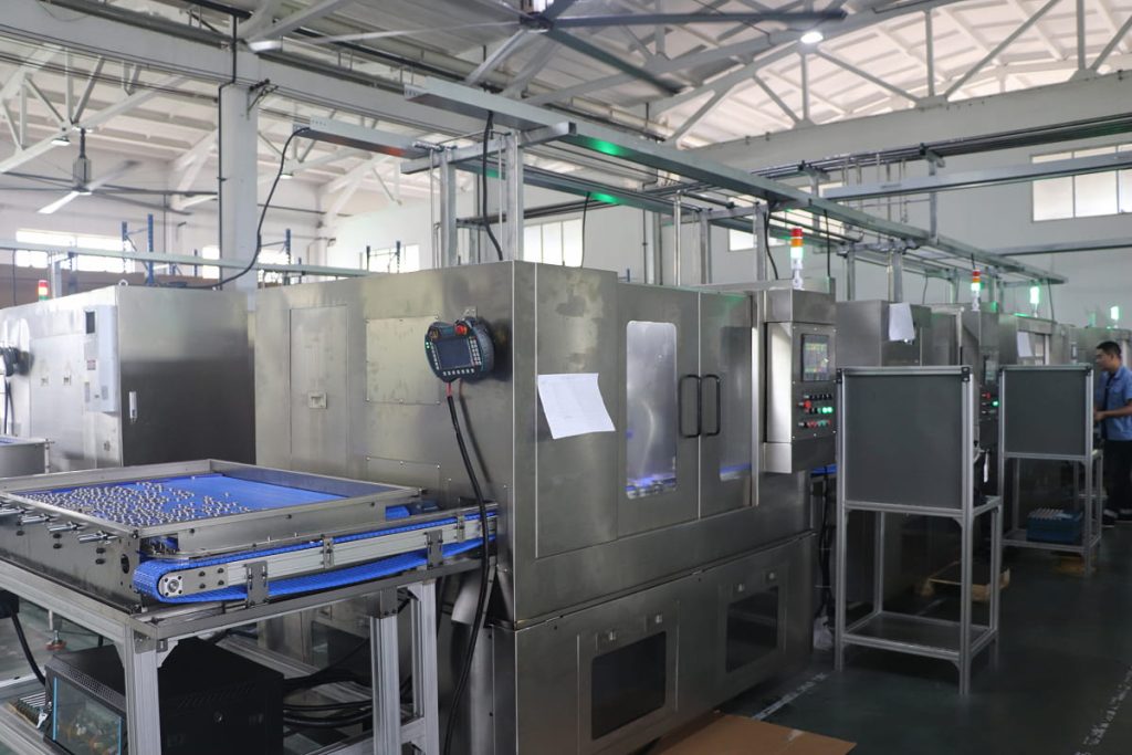 Engineers at a production machine